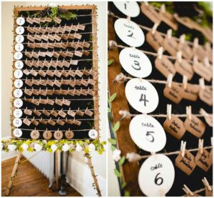 Escort card display sign using frame and string for a rustic feel.
