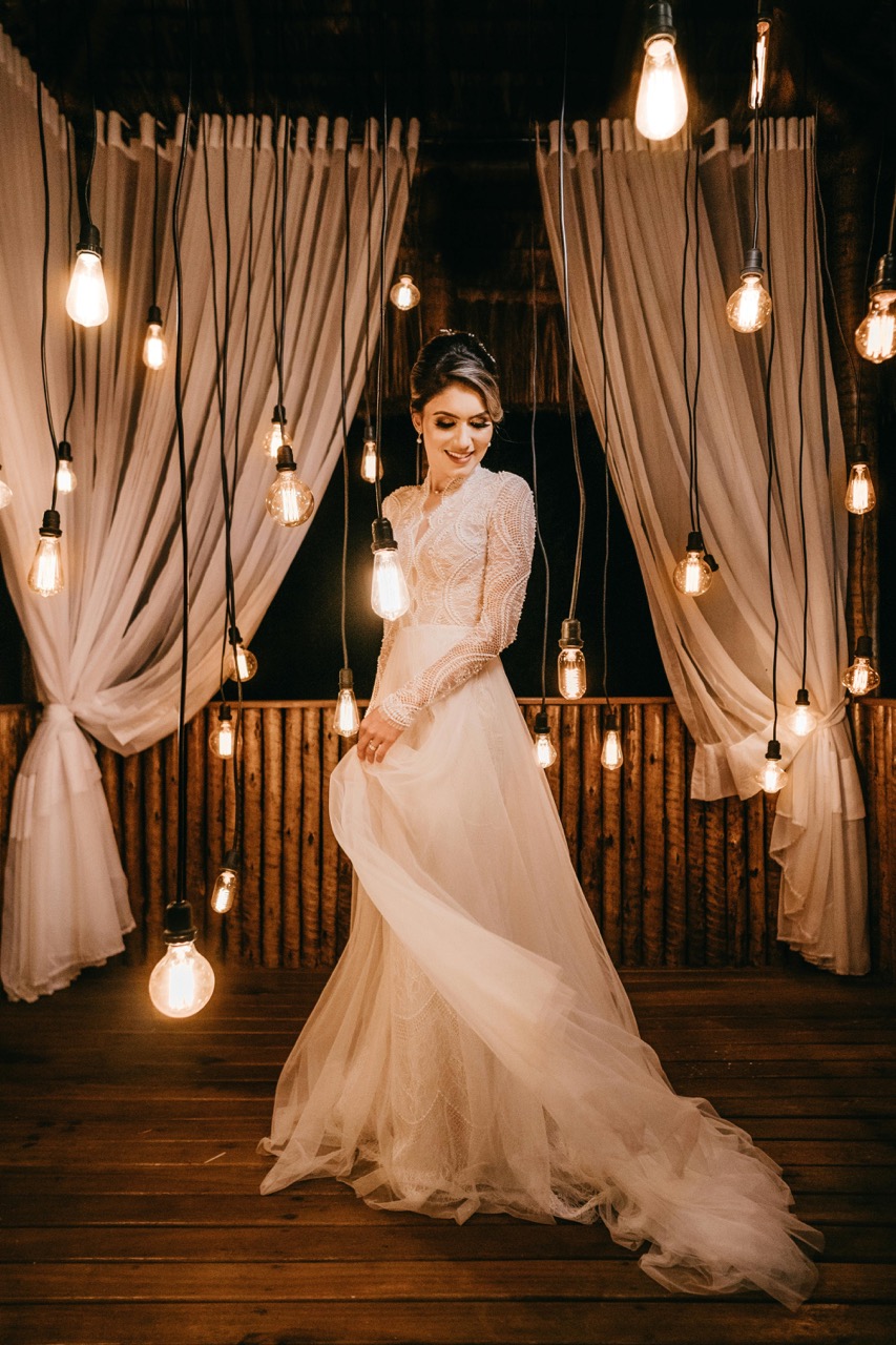 rustic bride with hanging lightbulbs