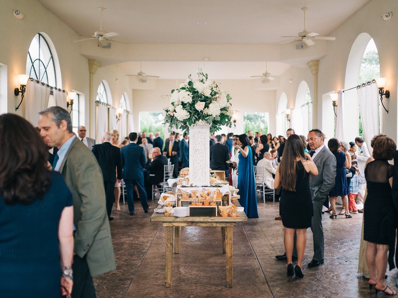 wedding guests mingling during outdoor wedding