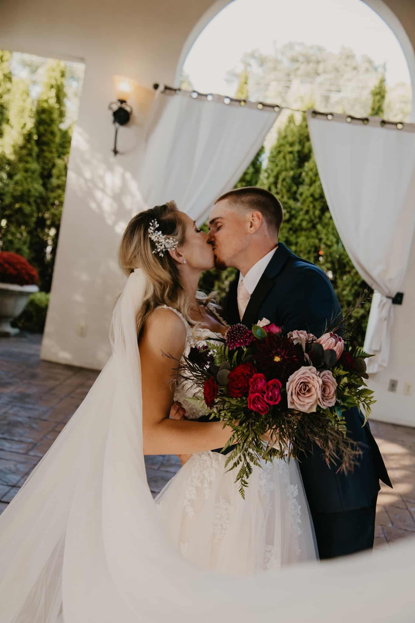 bride and groom kissing